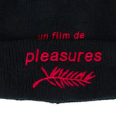 PLEASURES FIL Beanie at Gravity NYC